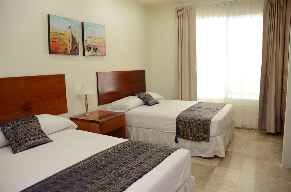 Coral Maya Stay Suites Puerto Aventuras Bagian luar foto